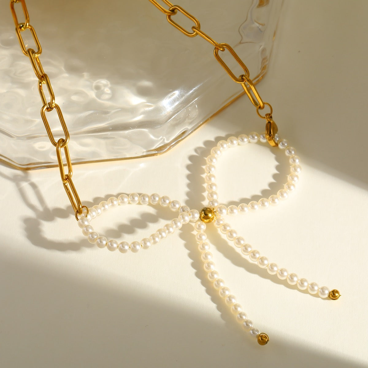 Perla · Collar con lazo