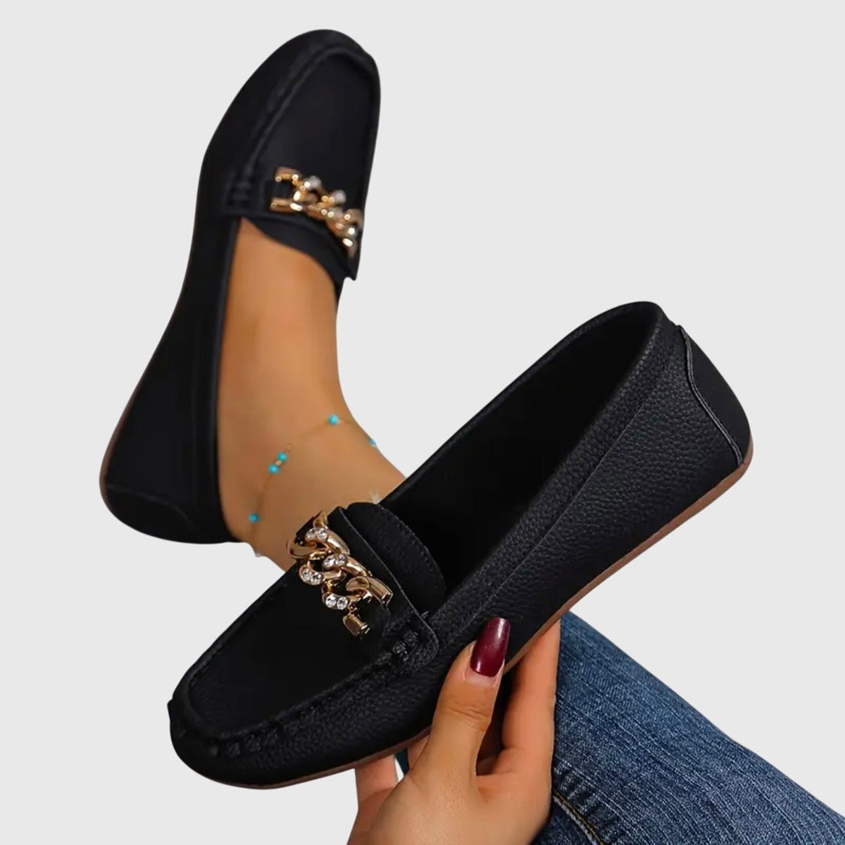 Edurne · Mocasín plano con hebilla de rombo