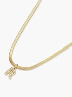 Pythona Charmed · Collar con inicial