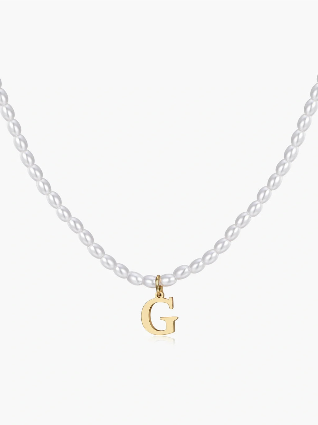 Elara · Collar de perlas con inicial