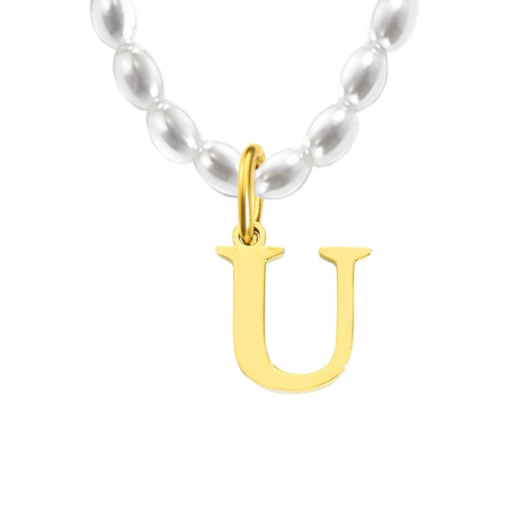 Elara · Collar de perlas con inicial