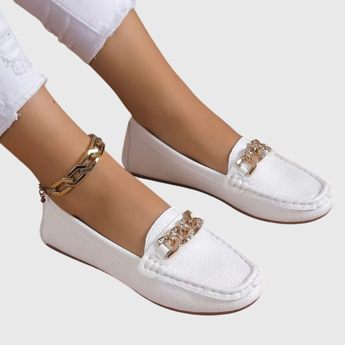 Edurne · Mocasín plano con hebilla de rombo