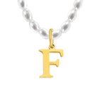 Elara · Collar de perlas con inicial