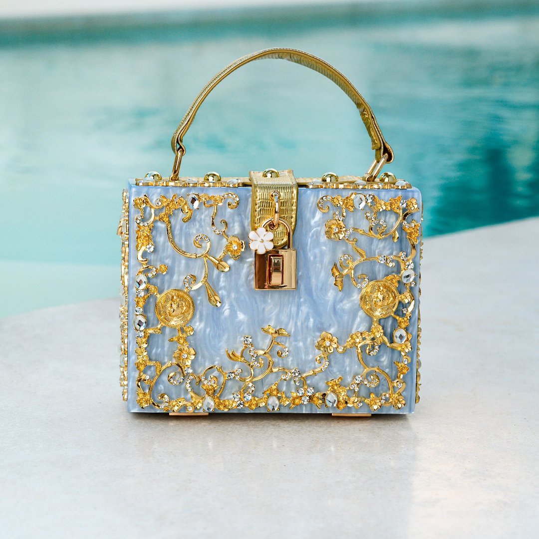 Vittoria · Bolso box de acrílico con detalle floral dorado