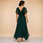 Elsa · Vestido largo con capas