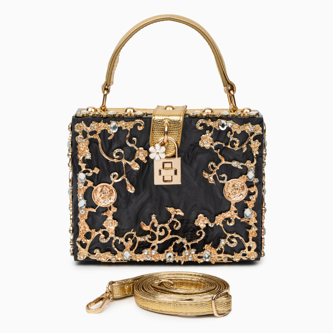 Vittoria · Bolso box de acrílico con detalle floral dorado