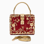 Vittoria · Bolso box de acrílico con detalle floral dorado