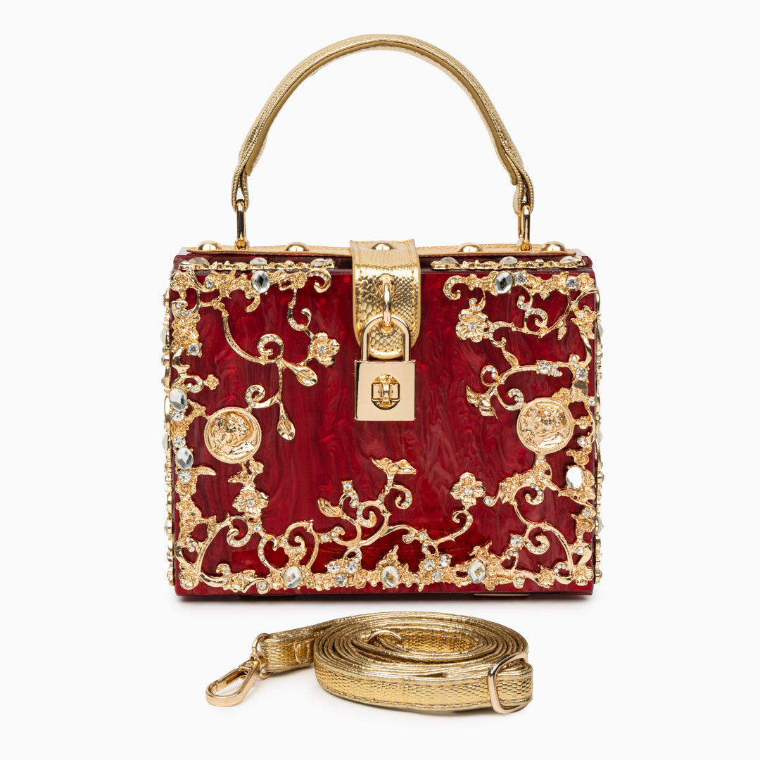 Vittoria · Bolso box de acrílico con detalle floral dorado
