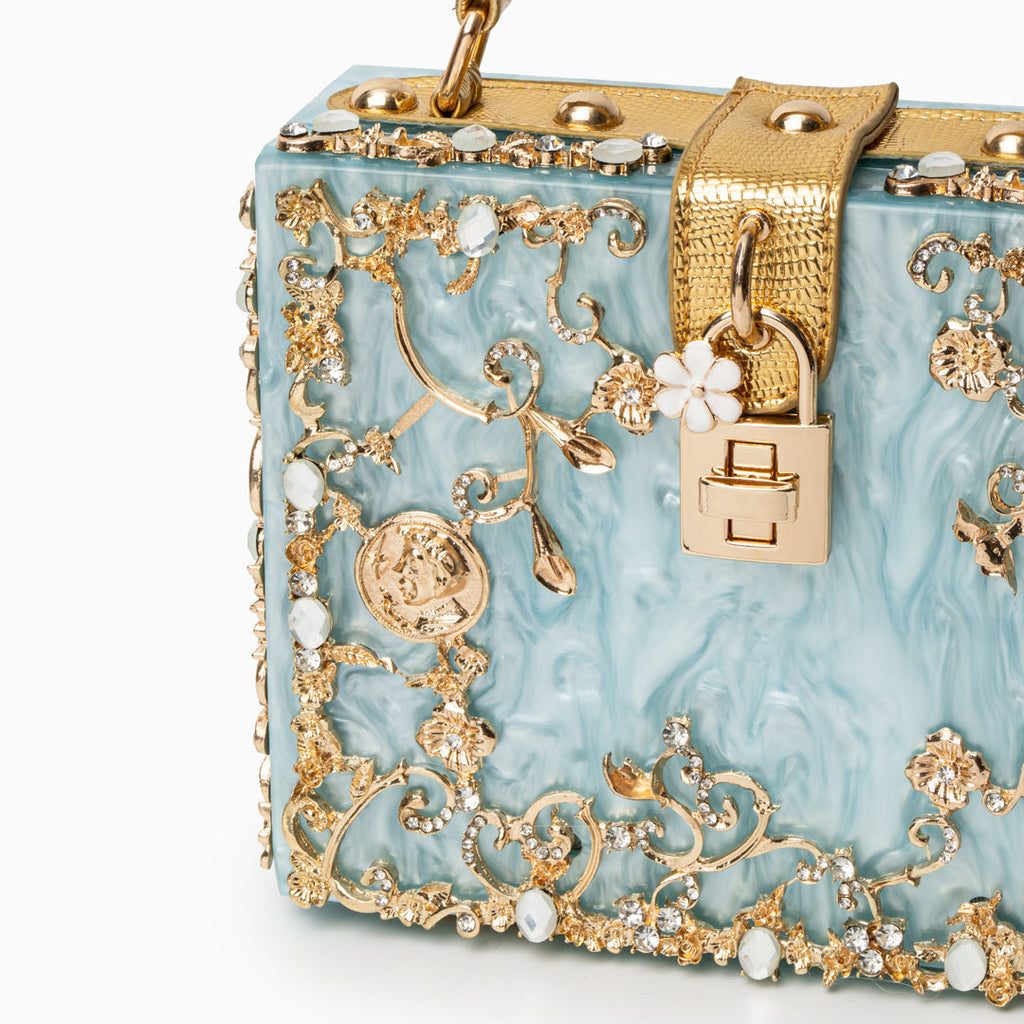 Vittoria · Bolso box de acrílico con detalle floral dorado
