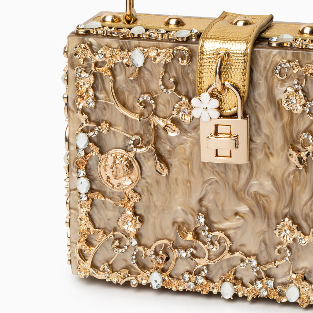 Vittoria · Bolso box de acrílico con detalle floral dorado