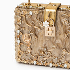 Vittoria · Bolso box de acrílico con detalle floral dorado