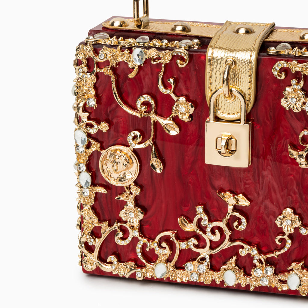 Vittoria · Bolso box de acrílico con detalle floral dorado