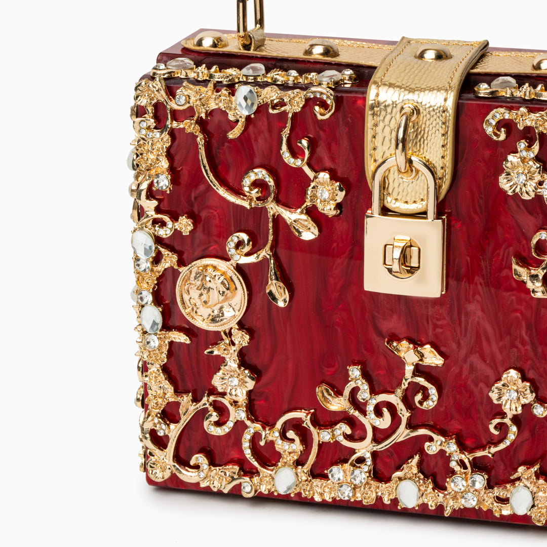 Vittoria · Bolso box de acrílico con detalle floral dorado