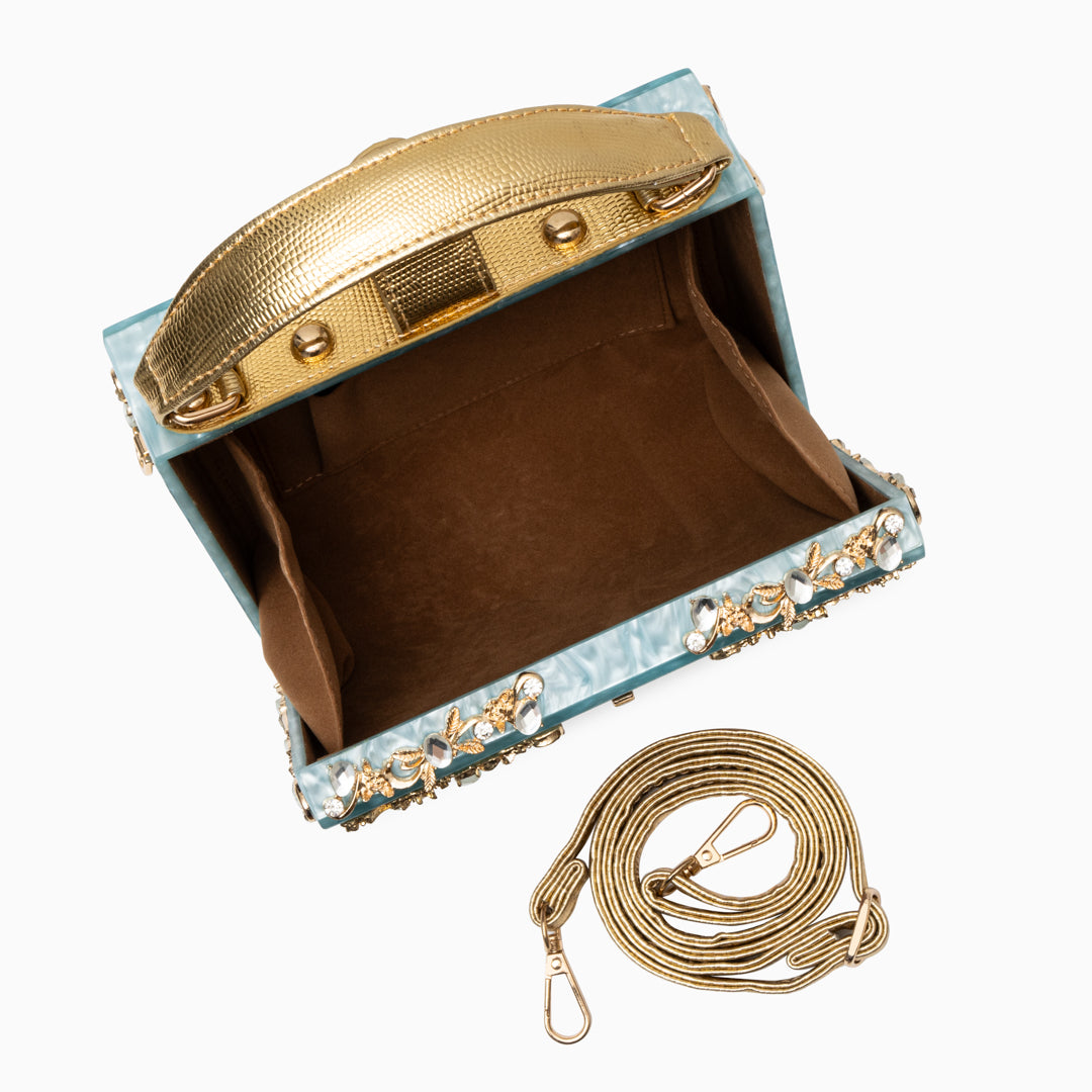 Vittoria · Bolso box de acrílico con detalle floral dorado