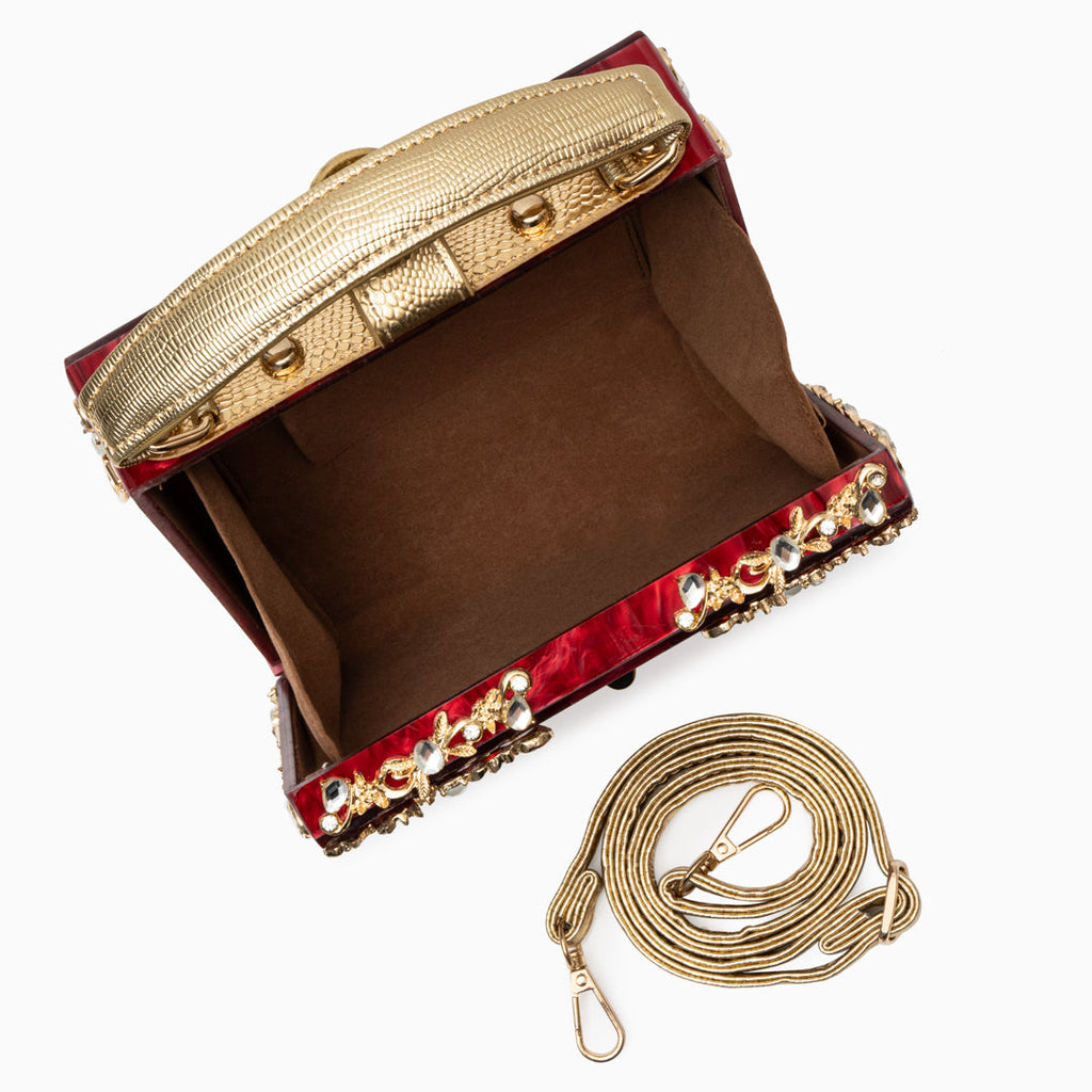 Vittoria · Bolso box de acrílico con detalle floral dorado