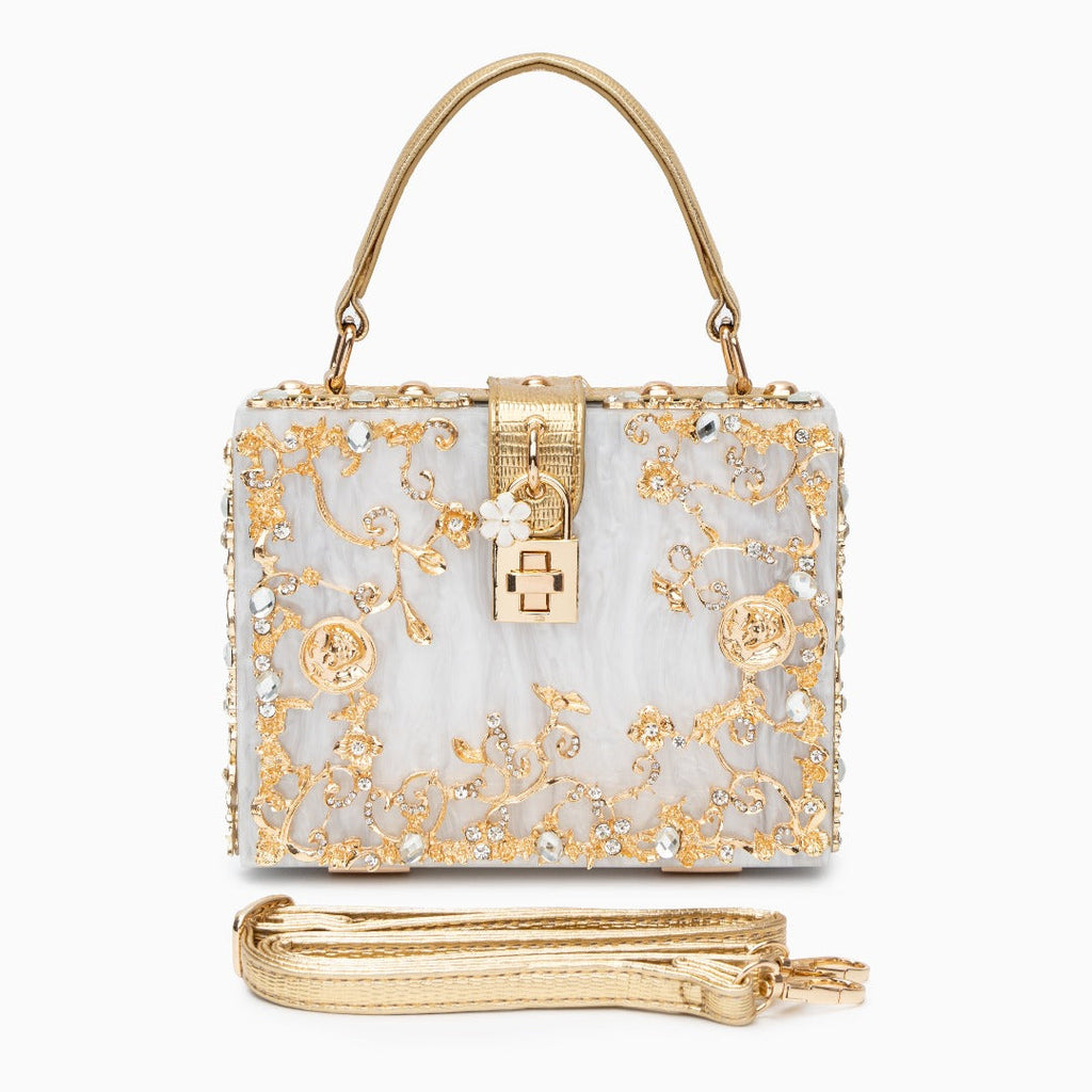 Vittoria · Bolso box de acrílico con detalle floral dorado