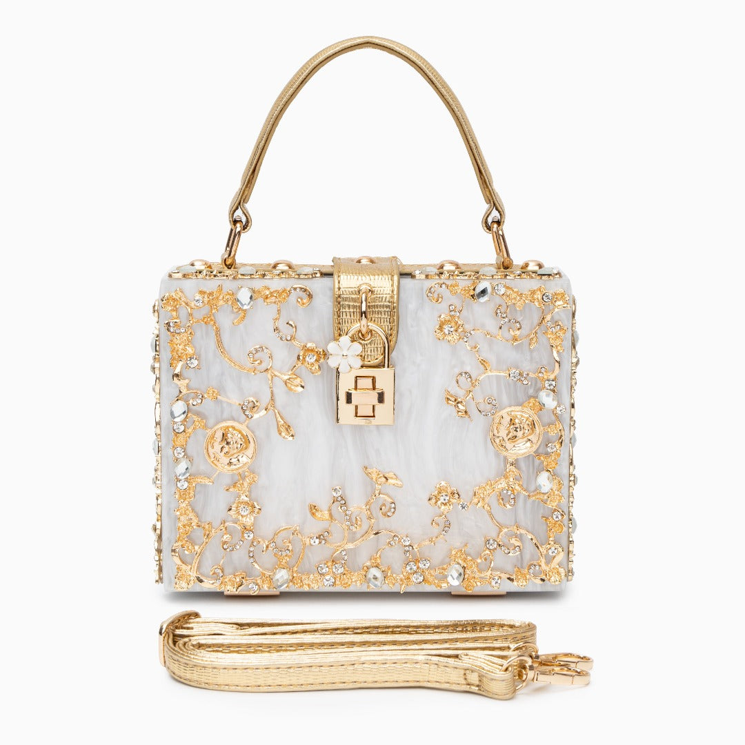 Vittoria · Bolso box de acrílico con detalle floral dorado