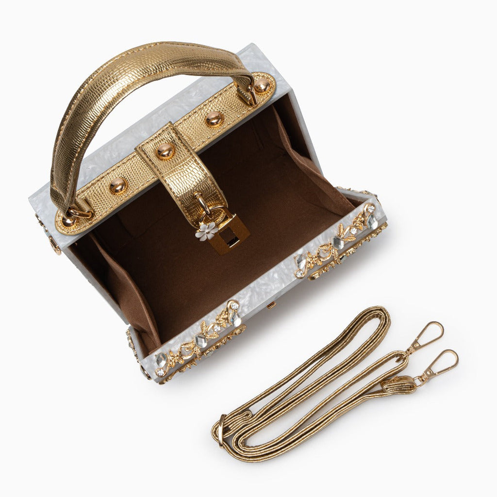 Vittoria · Bolso box de acrílico con detalle floral dorado