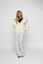 Martina · Chaqueta de punto con capucha de piel
