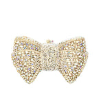 Ora · Clutch con strass y nudo