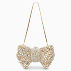 Ora · Clutch con strass y nudo