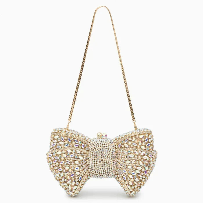 Ora · Clutch con strass y nudo
