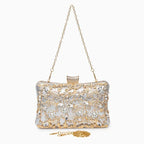 Ema · Clutch con strass y detalle de nudo