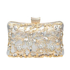 Ema · Clutch con strass y detalle de nudo