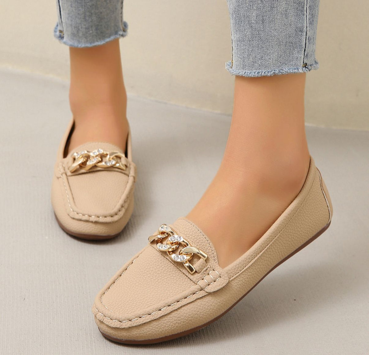 Edurne · Mocasín plano con hebilla de rombo
