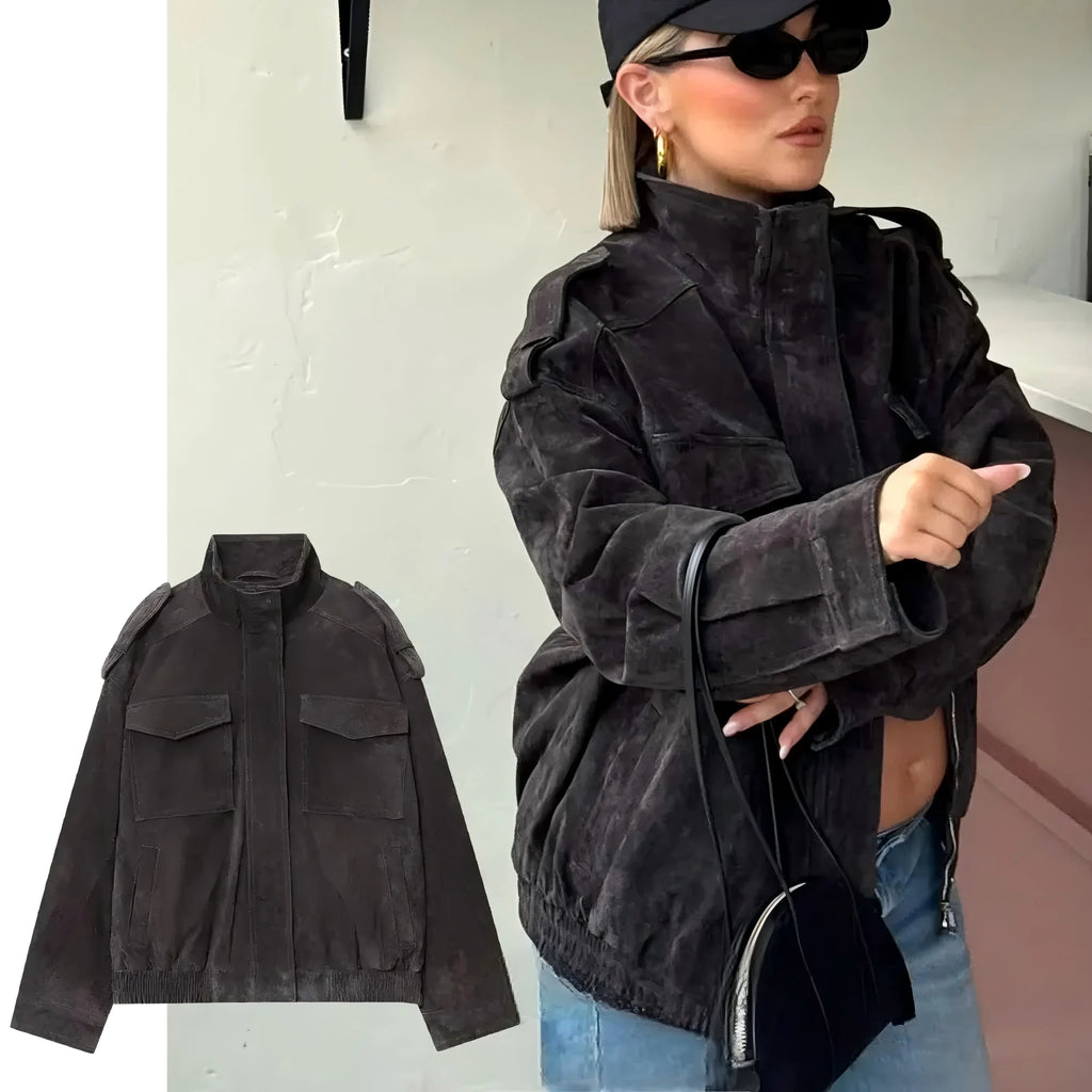 Chaqueta efecto ante en negro sobre fondo claro junto a modelo en primer plano