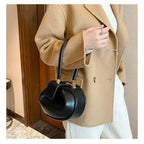 Valeria · Bolso con asa superior
