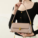 Camilla · Bolso compacto con asa superior