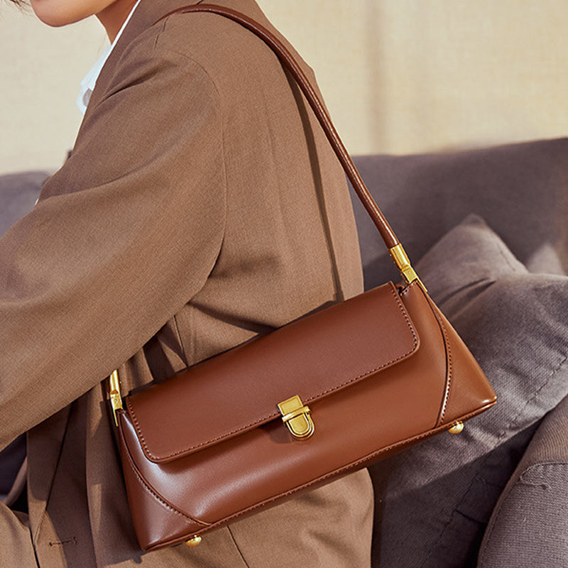 Camilla · Bolso compacto con asa superior