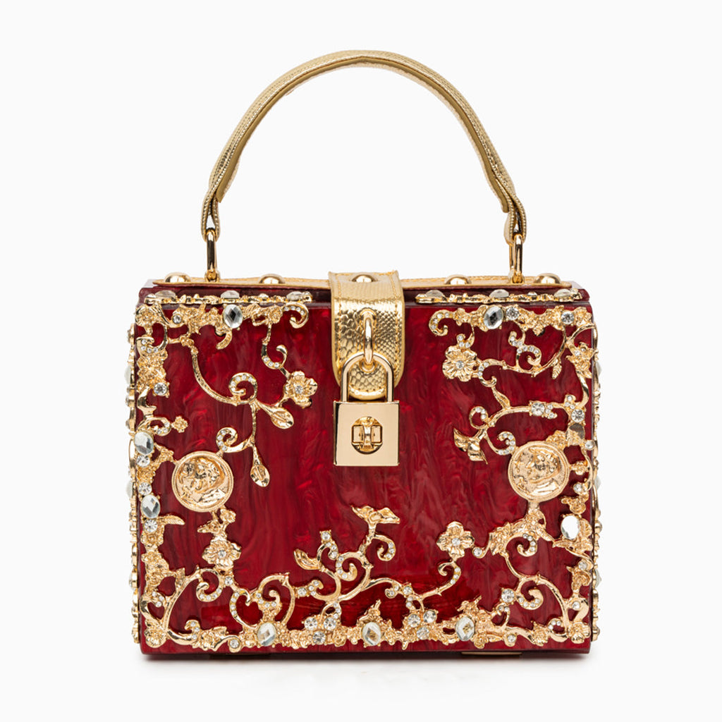 Vittoria · Bolso box de acrílico con detalle floral dorado