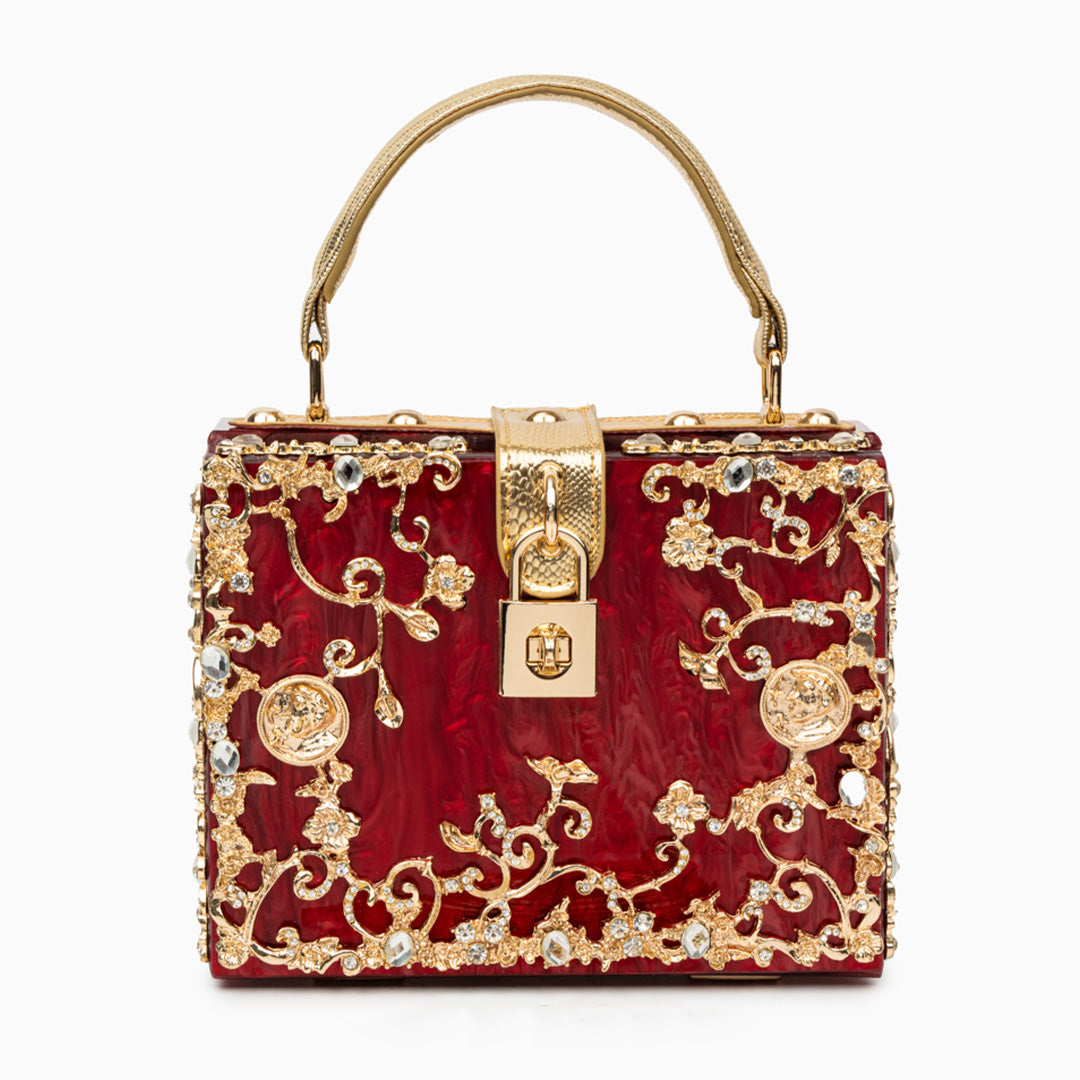 Vittoria · Bolso box de acrílico con detalle floral dorado
