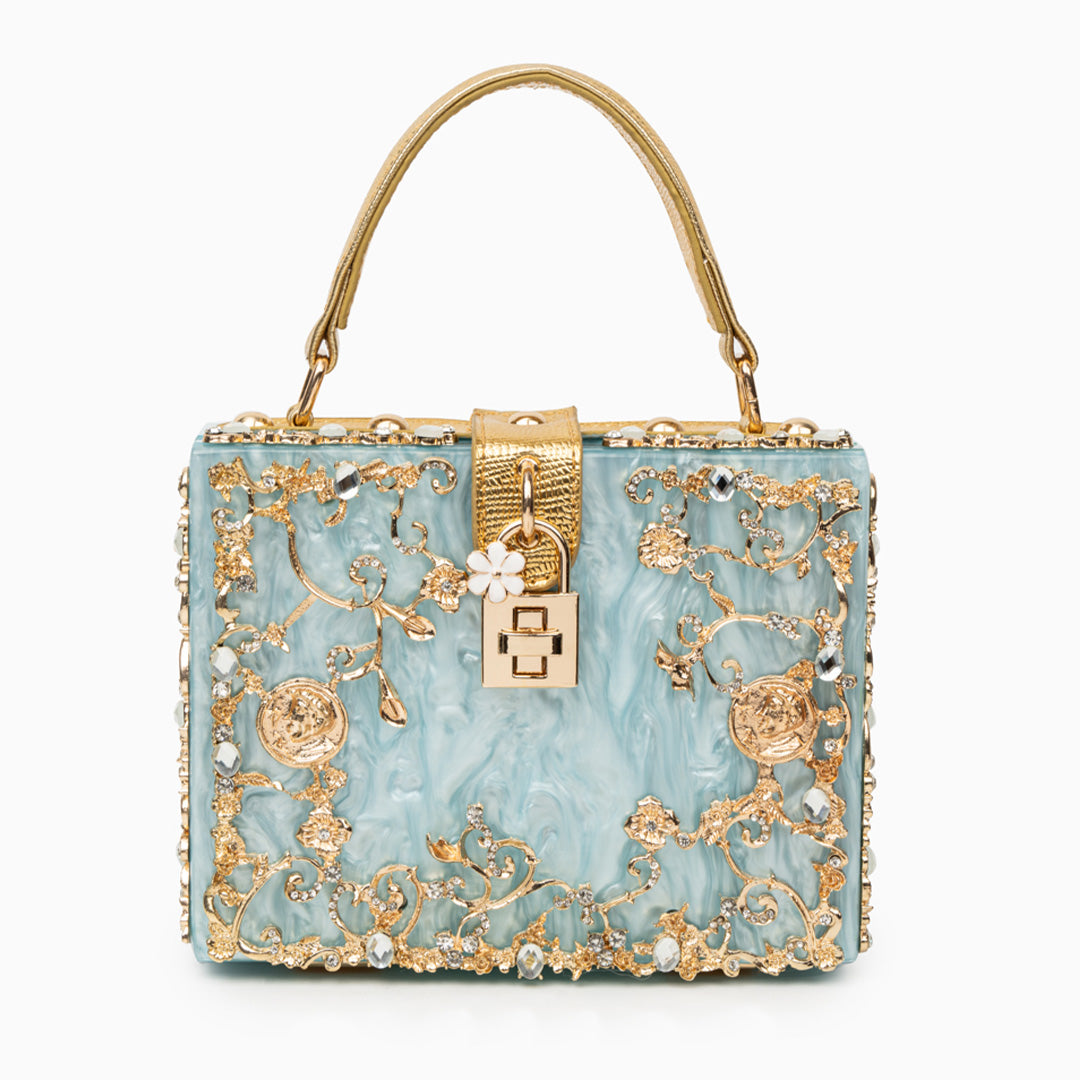 Vittoria · Bolso box de acrílico con detalle floral dorado
