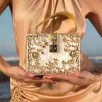 Vittoria · Bolso box de acrílico con detalle floral dorado
