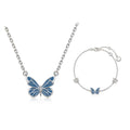 Set Mariposa Azul: collar y pulsera de plata con mariposas de esmalte azul, presentados juntos sobre fondo blanco