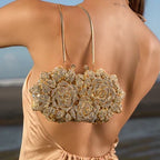 Luna Spark · Clutch con strass y nudo decorativo