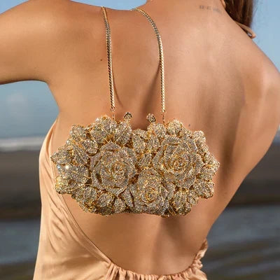 Luna Spark · Clutch con strass y nudo decorativo