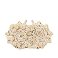 Luna Spark · Clutch con strass y nudo decorativo