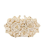 Luna Spark · Clutch con strass y nudo decorativo