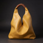 Ilaria · Bolso hobo con asa de ratán