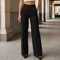 Paula · Pantalón de tiro alto y pernera ancha, en negro