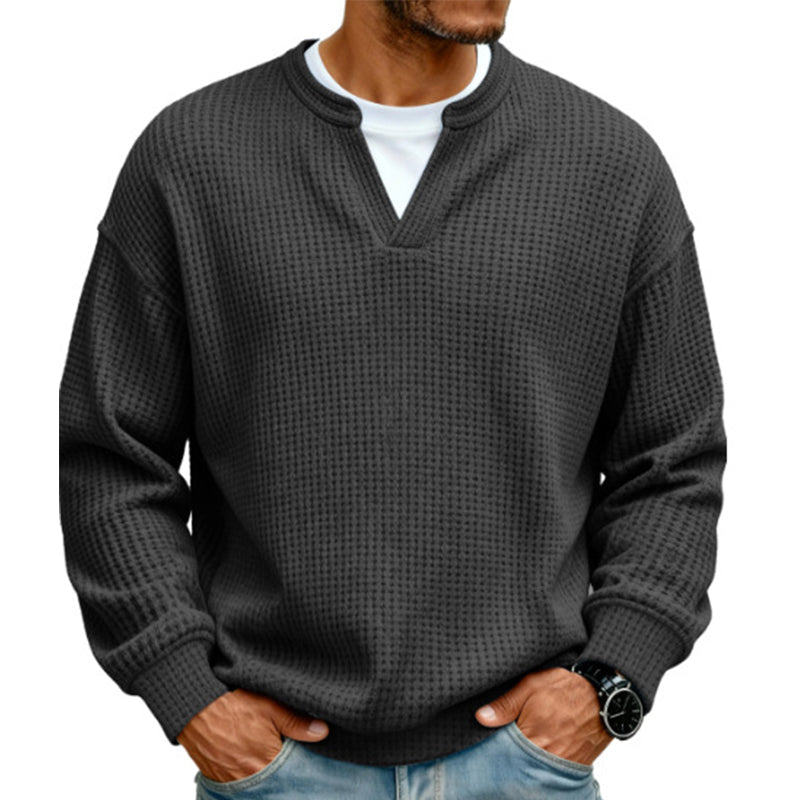 Dario · Camiseta de punto gofre con cuello de pico, color negro