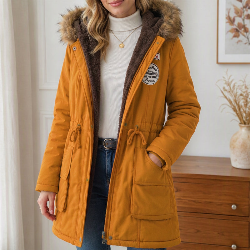 Lena · Parka con capucha y ribete de pelo en mostaza